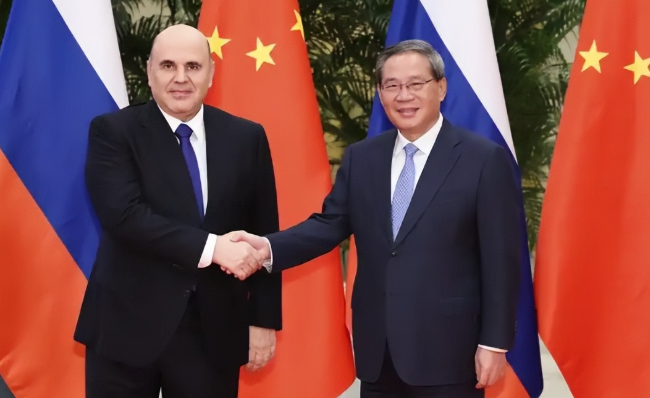 此前归还给中国的土地普京又起念头了外媒：中国再度雪中送暖